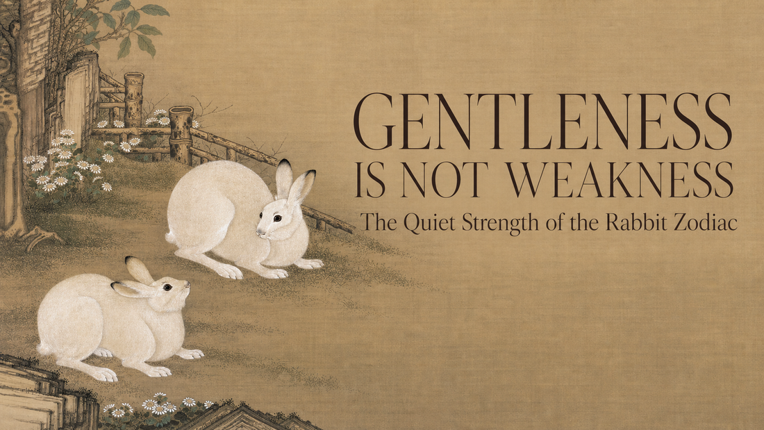 Two white rabbits in a traditional Chinese painting beside the title Gentleness Is Not Weakness