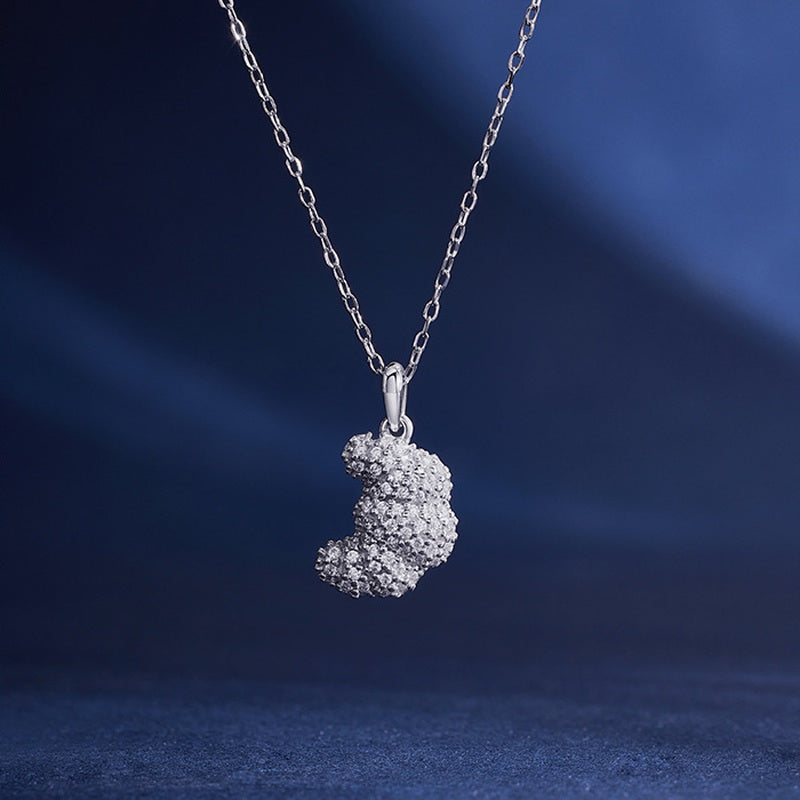 S925 silver croissant pendant necklace on deep blue background
