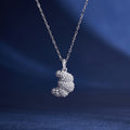 S925 silver croissant pendant necklace on deep blue background