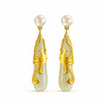 Hetian jade phoenix earrings pair on a clean white background