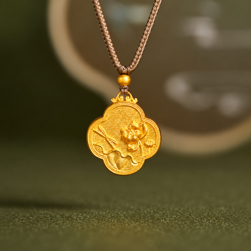 Lotus and dragonfly pendant suspended against olive green background