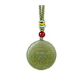 Centered Zakiram nephrite jade pendant on white background