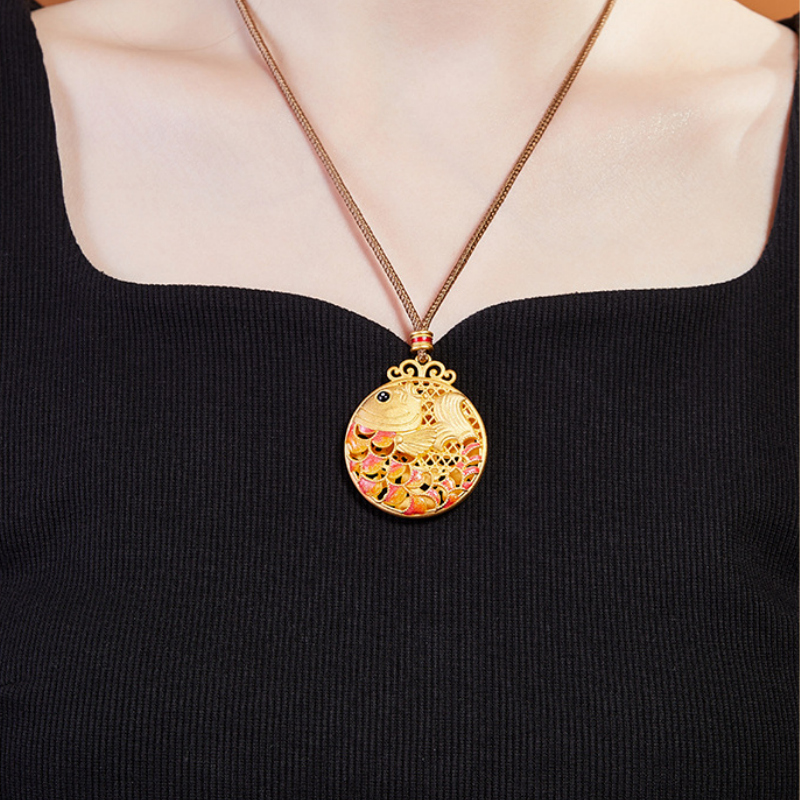 Supplier model wearing Koi Fish necklace