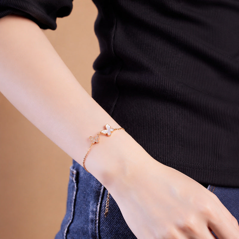 Double butterfly bracelet worn on wrist