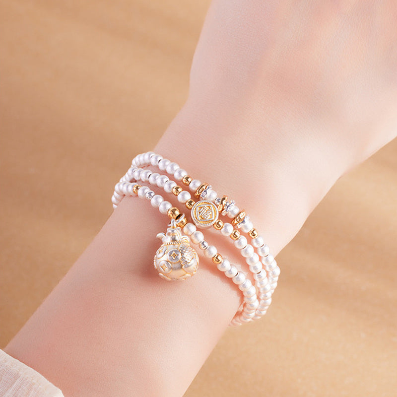 Koi Fish fortune pouch bracelet worn on wrist