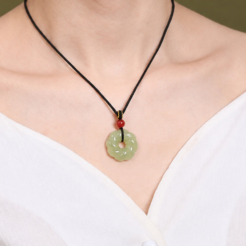 Model wearing the nephrite jade twist ring pendant necklace