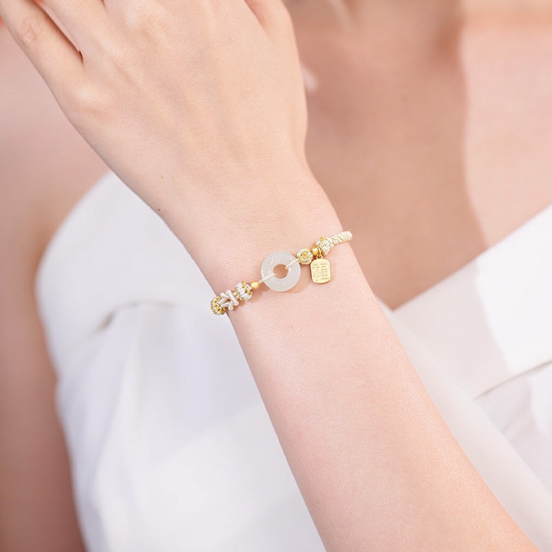 Phoenix nephrite jade bracelet worn on wrist