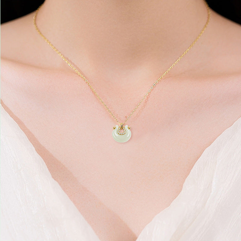 Hetian jade crescent peace lock necklace worn at the neckline