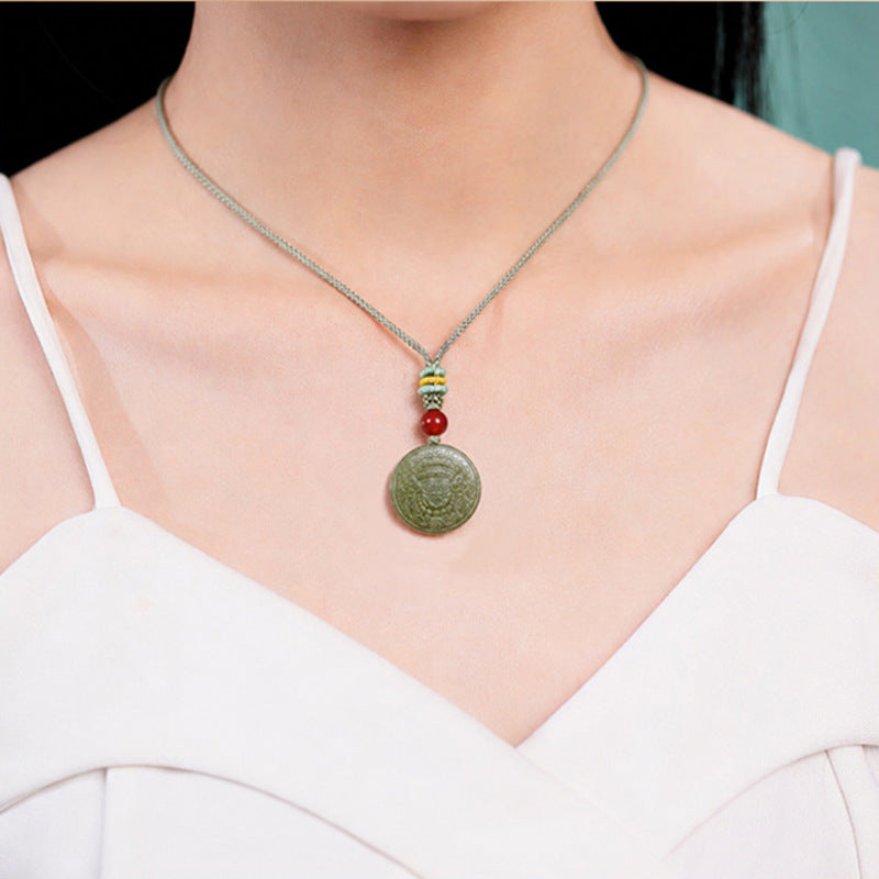 Zakiram nephrite jade pendant worn by model