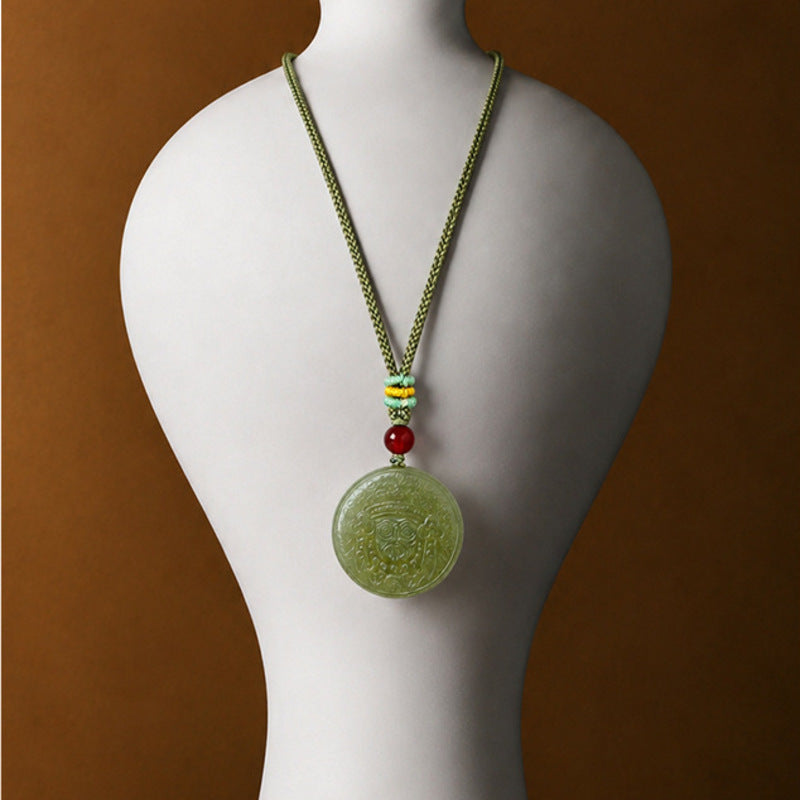 Zakiram nephrite jade pendant displayed on jewelry bust