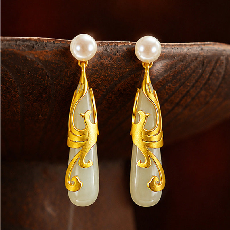Pair of Hetian jade phoenix earrings with freshwater pearl studs