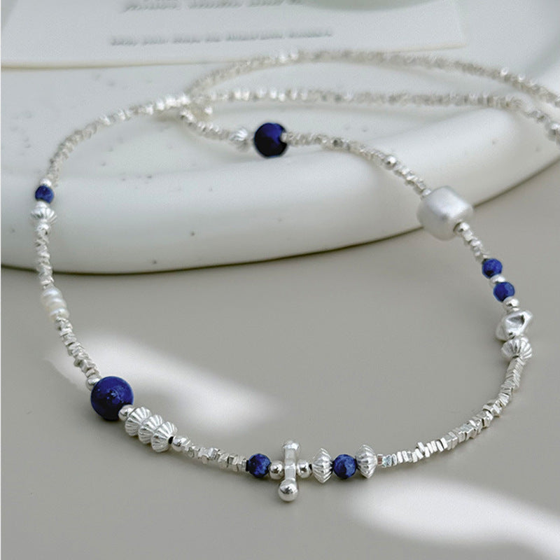 Lapis lazuli freshwater pearl silver necklace arranged in full front view