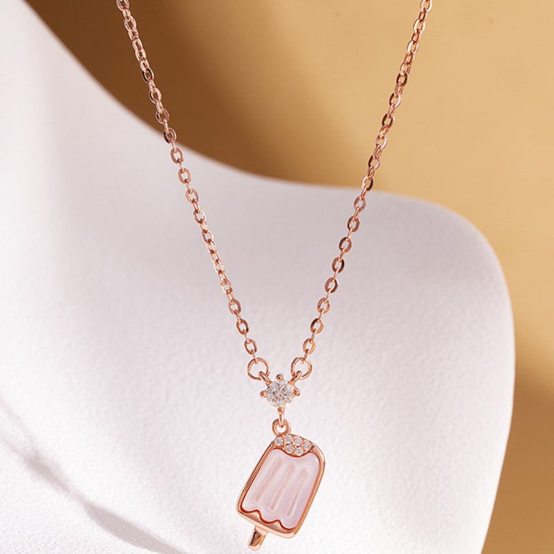 Pink popsicle pendant with cubic zirconia accent details