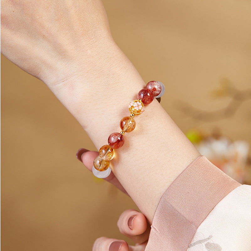 Close model wrist view of the butterfly crystal stretch bracelet
