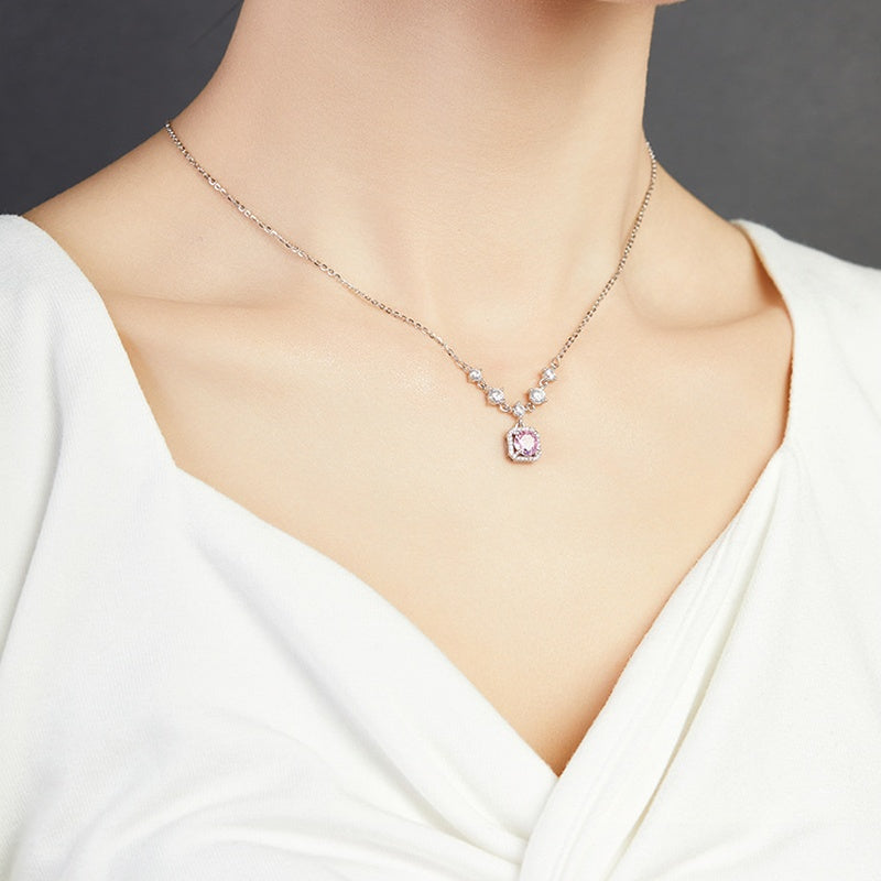 Supplier model wearing the necklace from an angled view