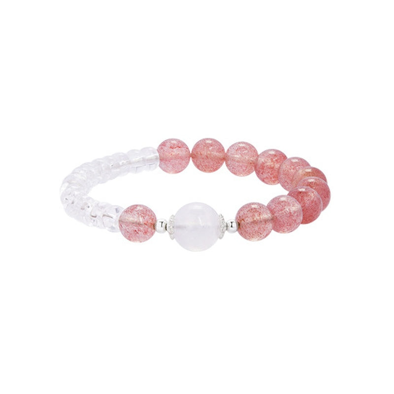 Strawberry crystal and clear quartz bracelet with moonstone on white background