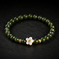 Nephrite Jade Bracelet with Mother-of-Pearl Flower-Grounded Elegance