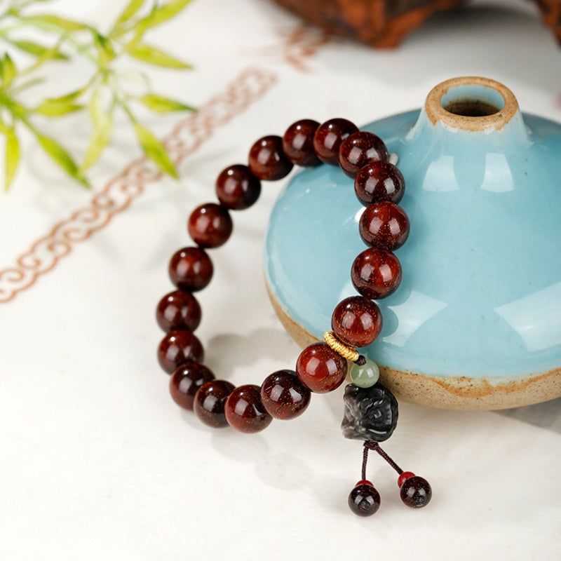 Silver Obsidian Lion Dance Head Sandalwood Bracelet-Grounded Resolve