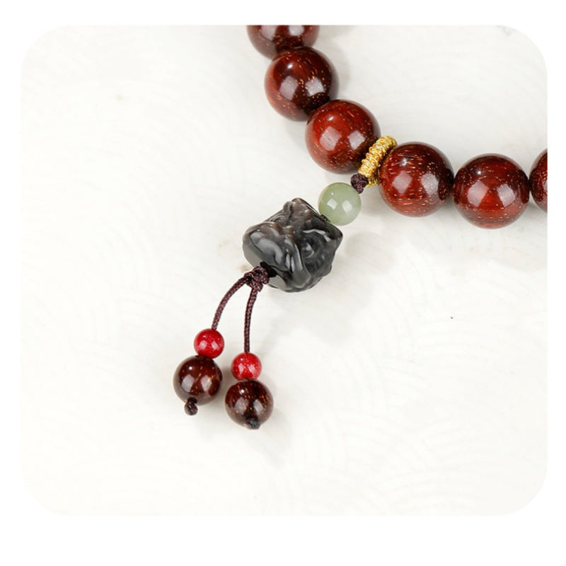 Silver Obsidian Lion Dance Head Sandalwood Bracelet-Grounded Resolve
