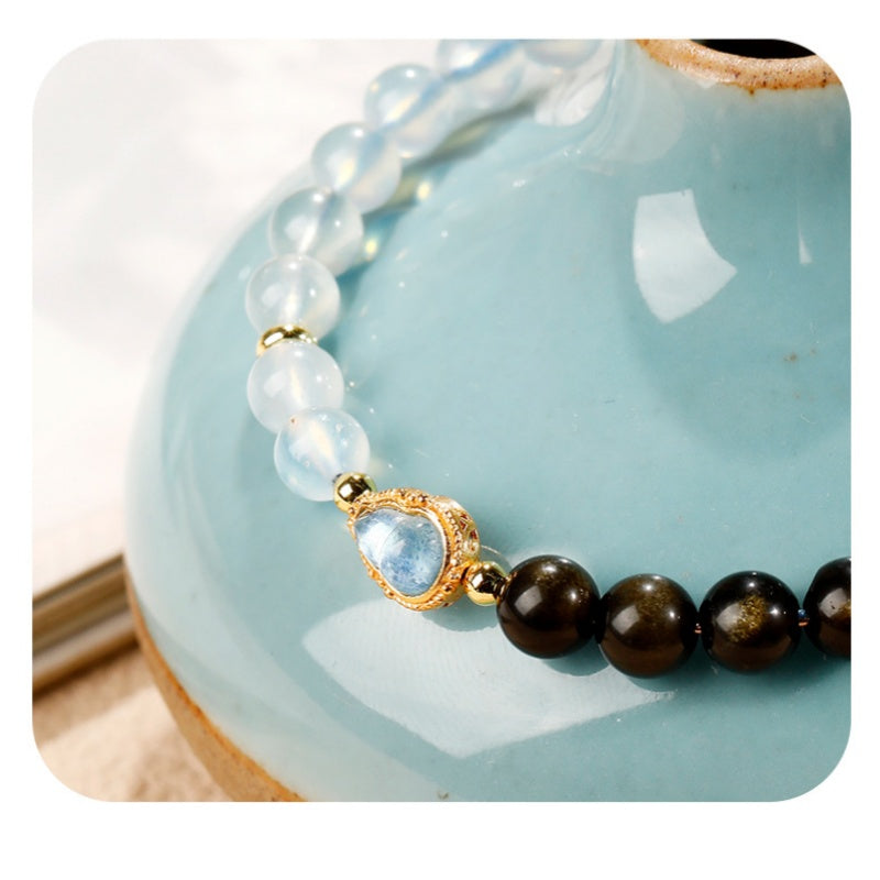 Clarity in Motion-Gold Obsidian Aquamarine Gourd Bracelet