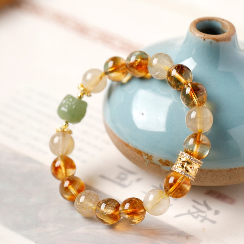 Confidence in Motion-Golden Rutilated Quartz Lion Bracelet