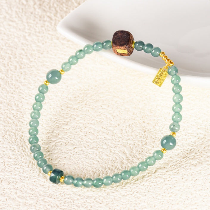 Ice Jade & Agarwood Harmony Bracelet-Whispers of Zen
