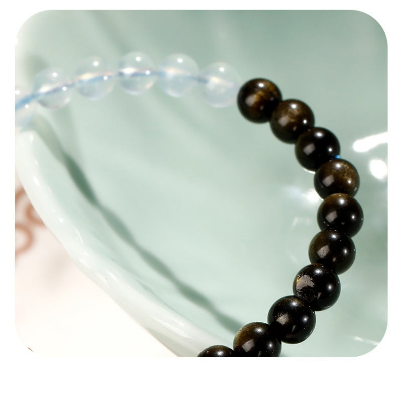 Clarity in Motion-Gold Obsidian Aquamarine Gourd Bracelet