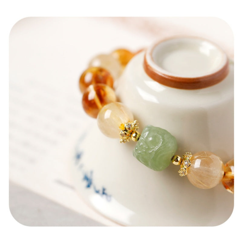 Confidence in Motion-Golden Rutilated Quartz Lion Bracelet