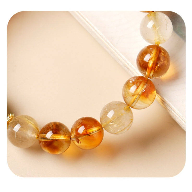Confidence in Motion-Golden Rutilated Quartz Lion Bracelet