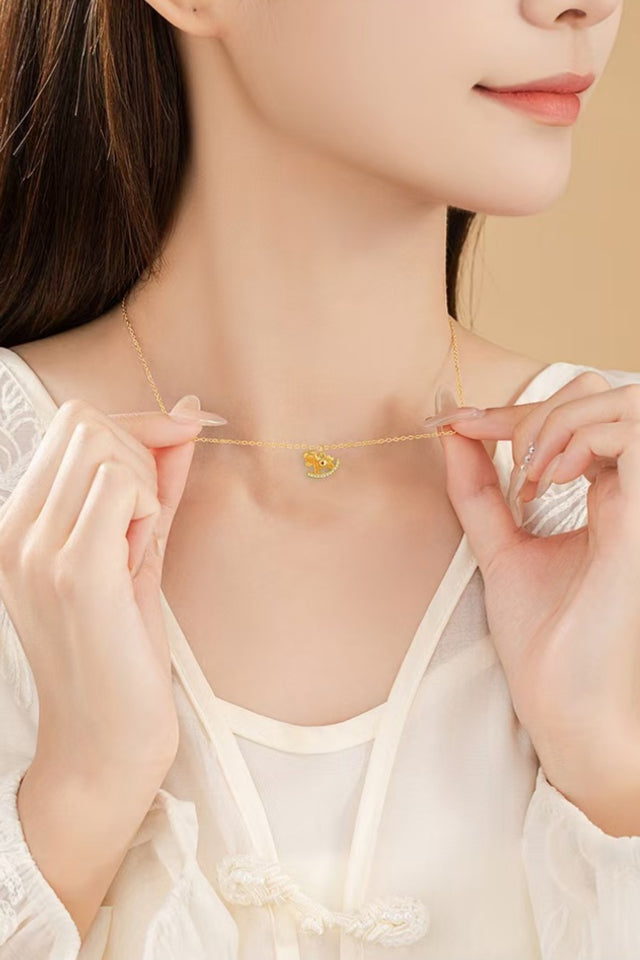 Gold Rocking Horse Fortune Necklace — luck, abundance, momentum