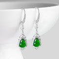Pair of green jade Wulu drop earrings with silver hooks and crystal halos