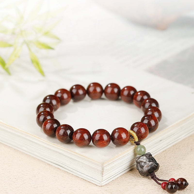 Silver Obsidian Lion Dance Head Sandalwood Bracelet-Grounded Resolve