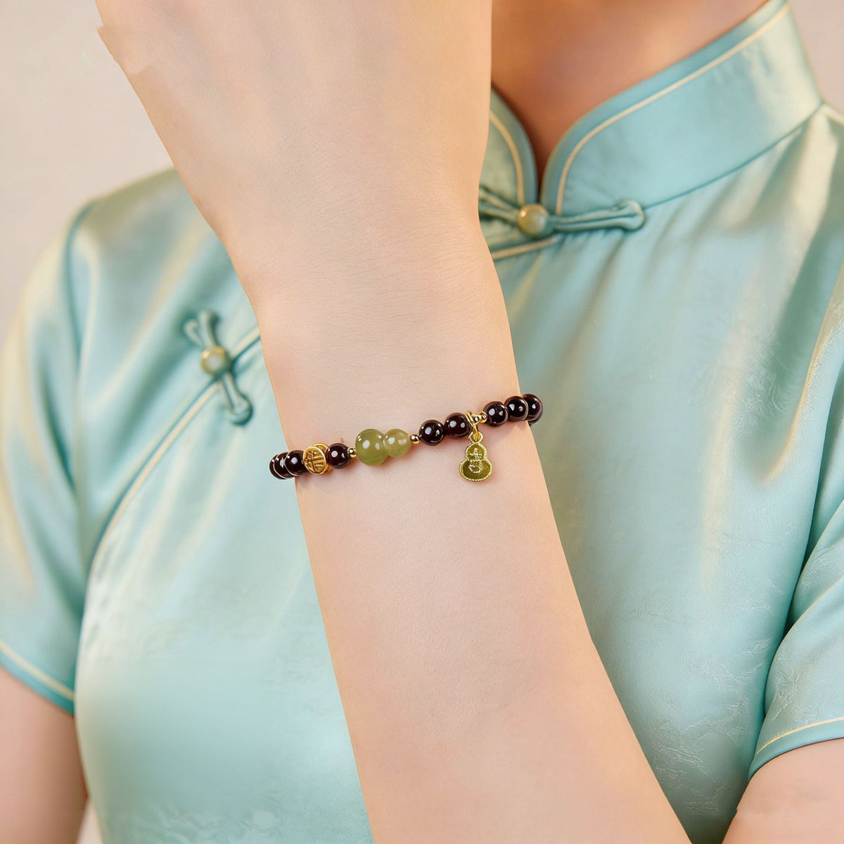 Blessings in Motion-Nephrite Jade Gourd Garnet Bracelet