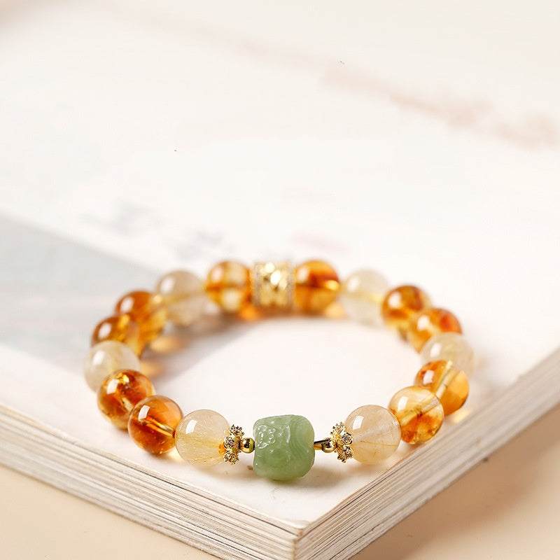 Confidence in Motion-Golden Rutilated Quartz Lion Bracelet