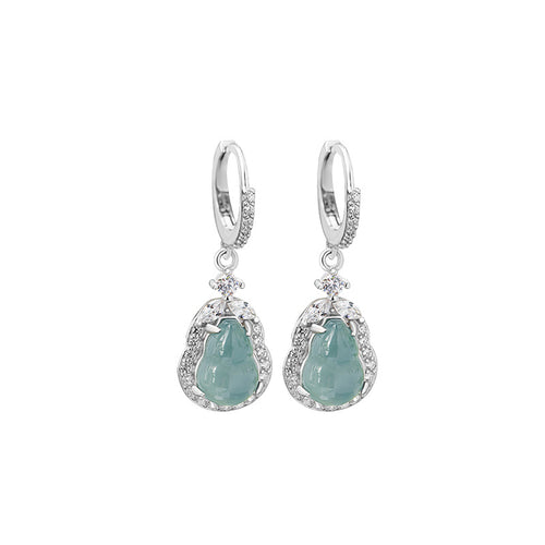 Pair of silver hoop earrings with pale blue-green ice jade calabash drops and crystal halos on white