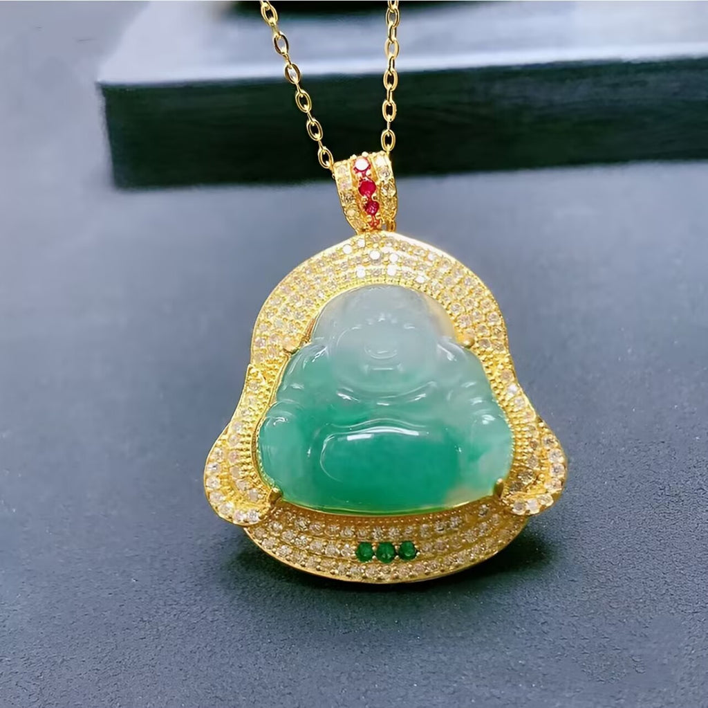 Green jade Laughing Buddha pendant displayed upright in a sparkling gold-plated frame
