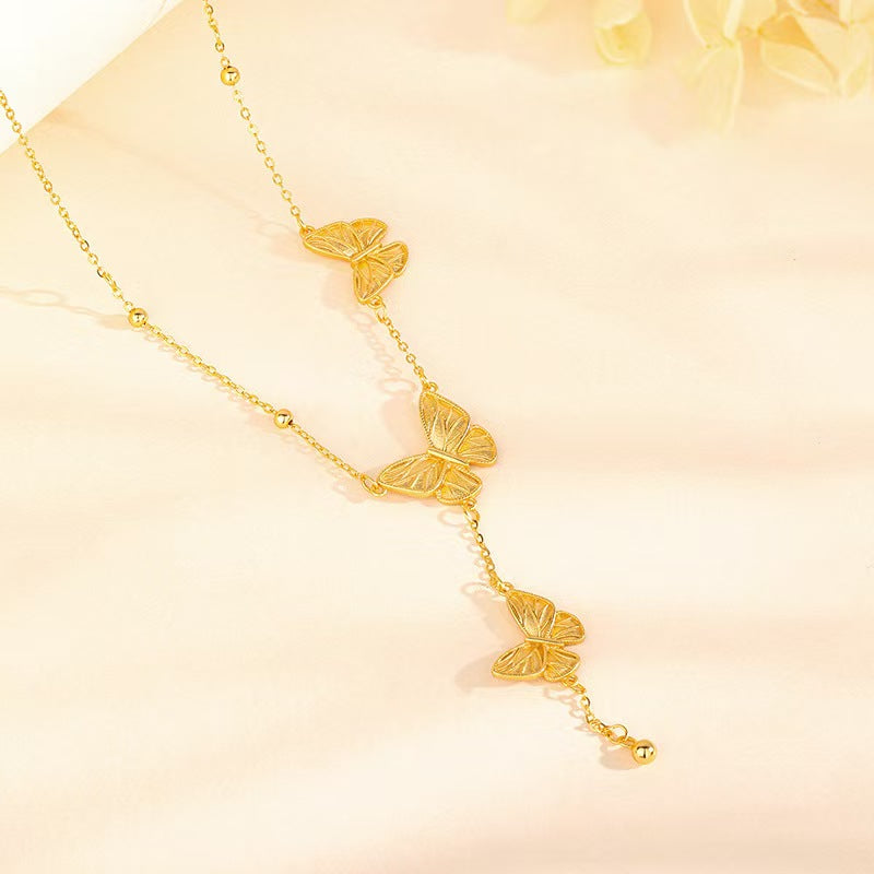 Gold Butterfly Cascade Necklace — Transformation · Lightness · New Beginnings
