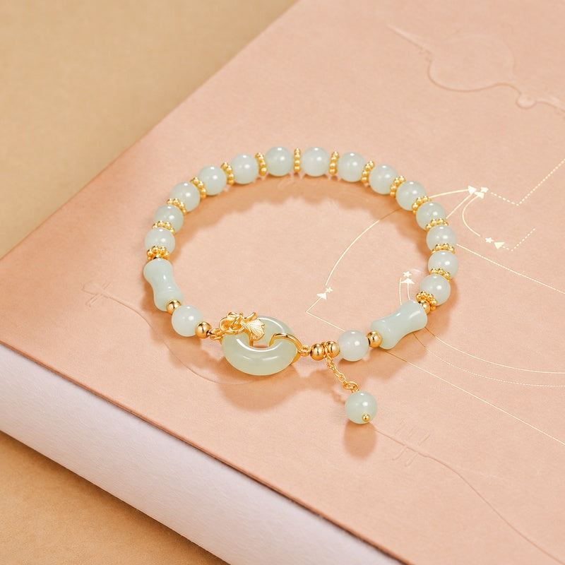 Angled view of the nephrite jade bracelet and leaf connection
