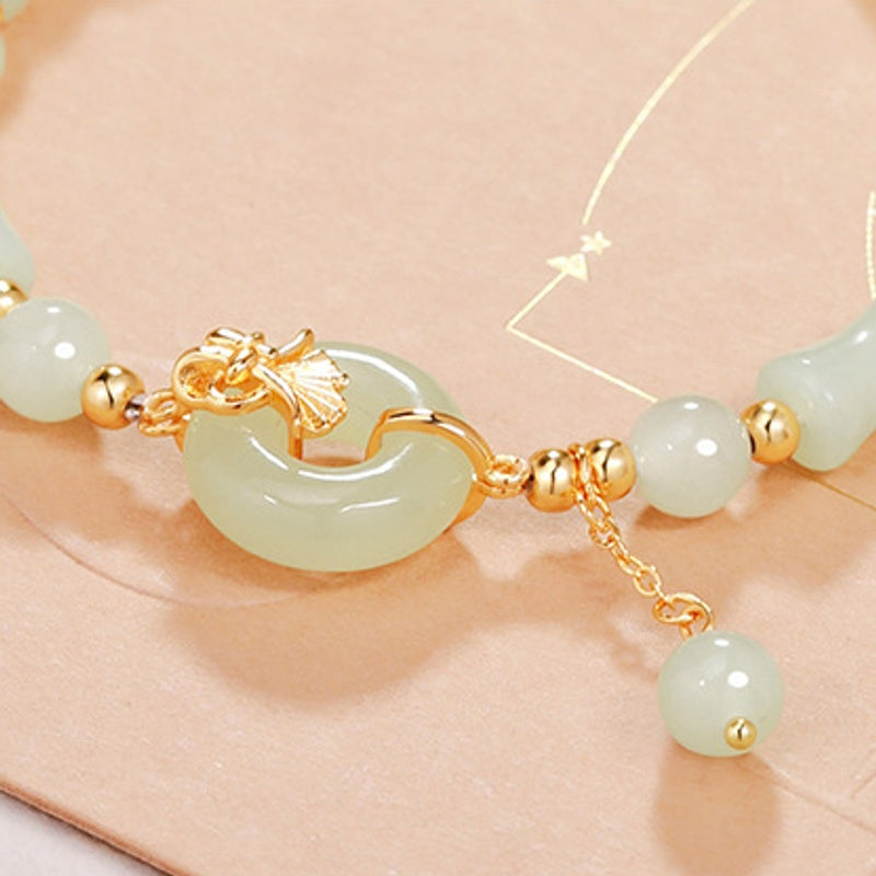 Close-up of the nephrite jade peace buckle and leaf detail