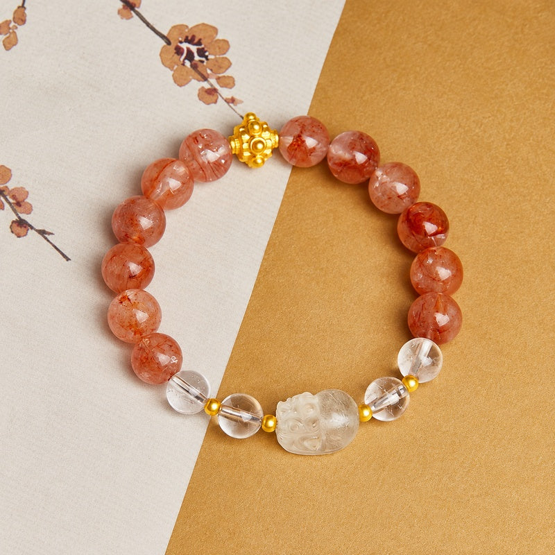 Pixiu bracelet on floral paper and warm ochre background