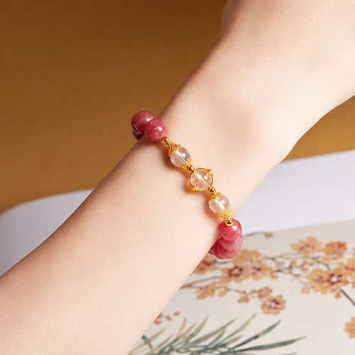 Supplier wrist view of the rhodonite and clear quartz bracelet