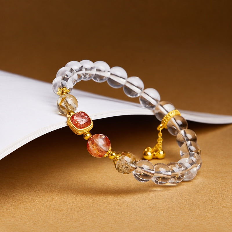 Angled view of the crystal bracelet and three-strand tassel