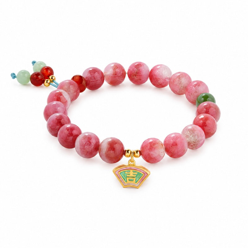 Rhodonite Ji charm bracelet with red agate and nephrite jade on white