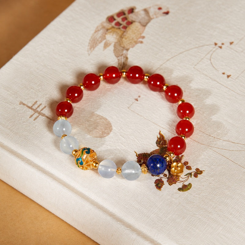 Overhead view showing the complete single-wrap red agate bracelet