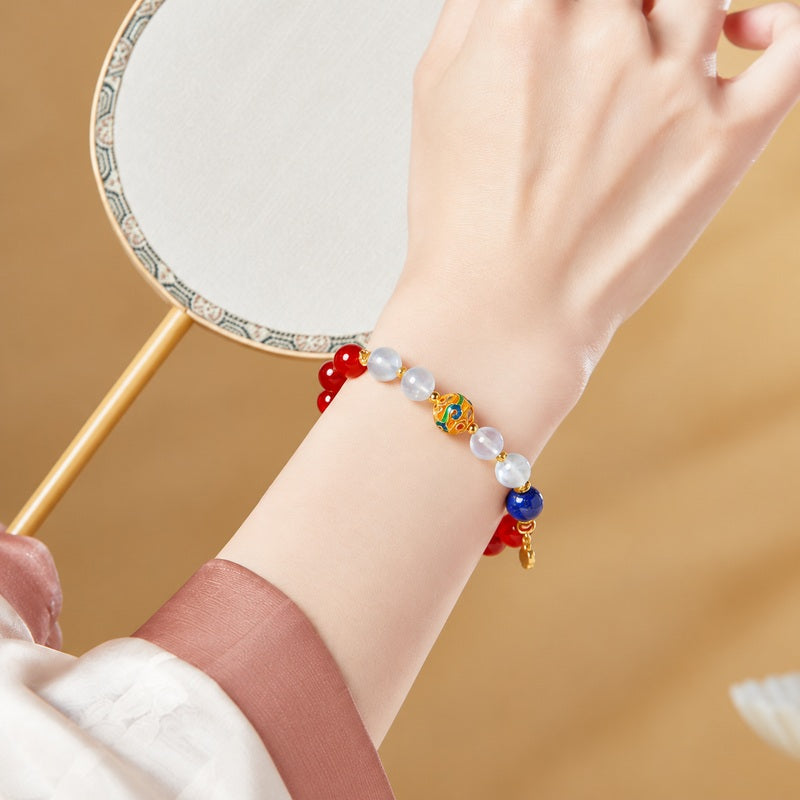 Original supplier model wearing the bracelet beside a fan