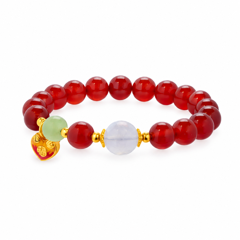 Red agate heart bracelet with jade and moonstone shown on white