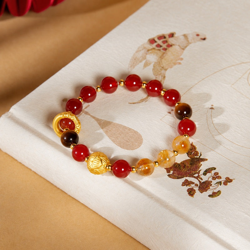 Red agate and tiger eye lotus bracelet photographed from above