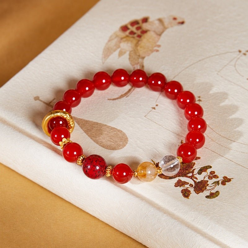 Overhead red agate bracelet photograph showing its complete single loop