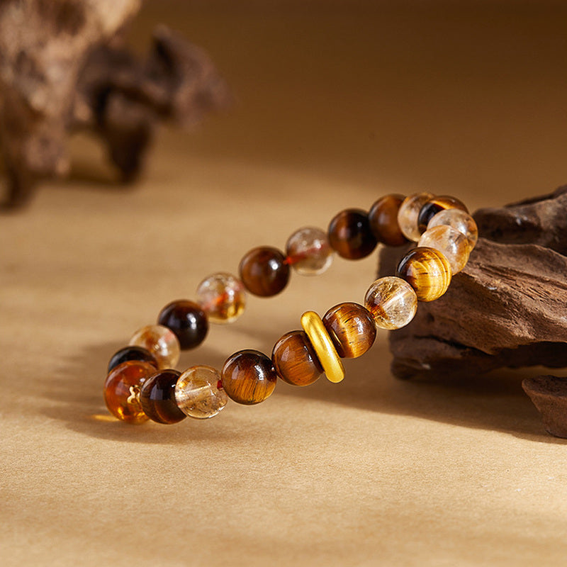 999 silver yellow quartz and tiger's eye bracelet on warm background