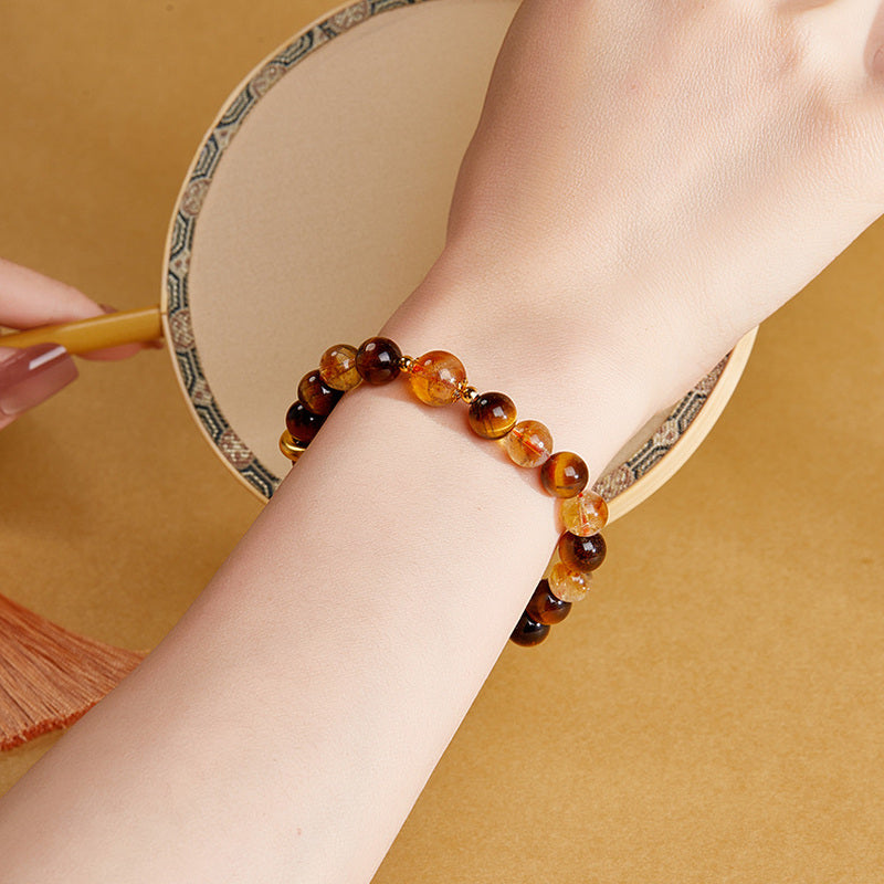 999 silver quartz bracelet styled on wrist beside a round mirror